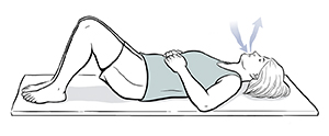 Woman lying on back with knees bent. Arrows show breathing in and out.