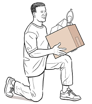 Side view of man on one knee lifting box.