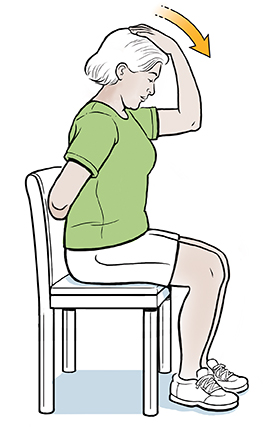Woman sitting on chair with one hand behind back and the other on top of head, pulling it forward.
