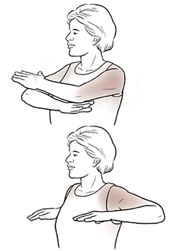 Mujer haciendo un ejercicio que consiste en cruzar los brazos.