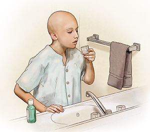Child standing at bathroom sink preparing to rinse mouth. Bottle of rinse is on counter next to sink.