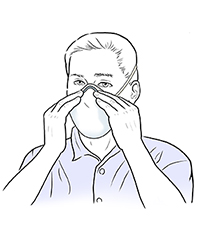 Hombre que presiona el sello nasal del barbijo antipolvo sobre su nariz.